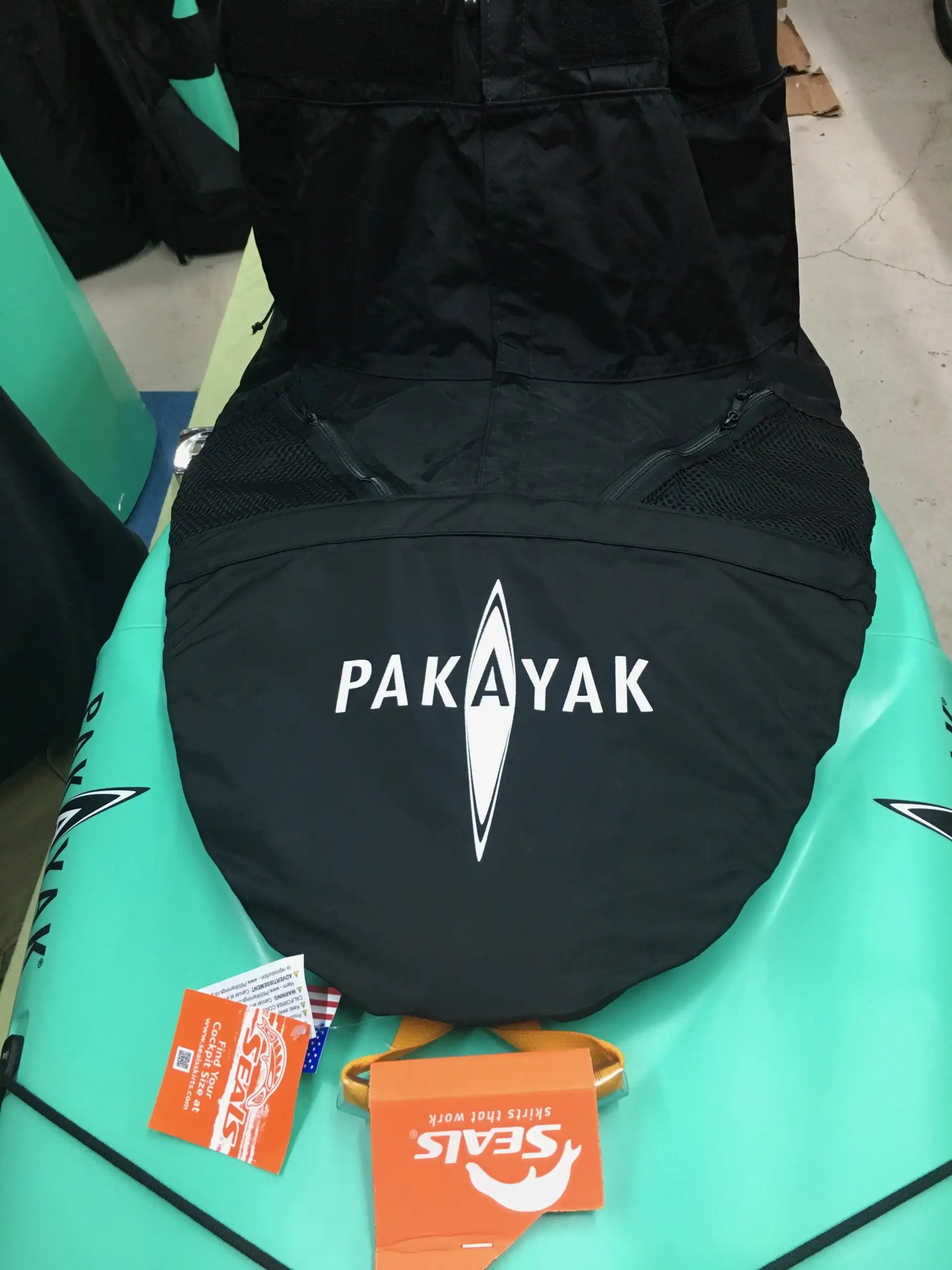 Pakayak nylon adjustable sprayskirt fitted on Bluefin kayak cockpit